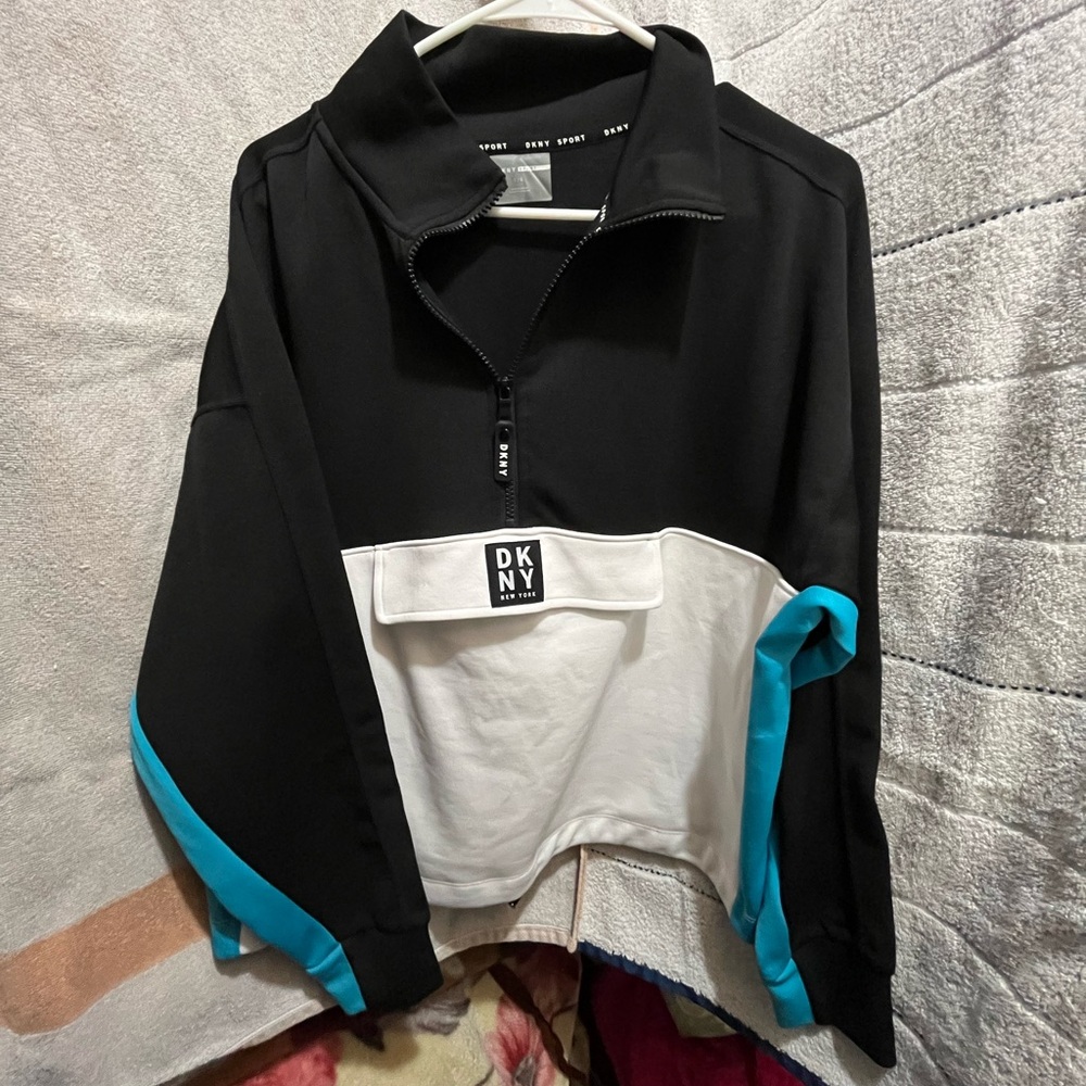 Brand new DKNY Black and White Sweater with Blue Accents